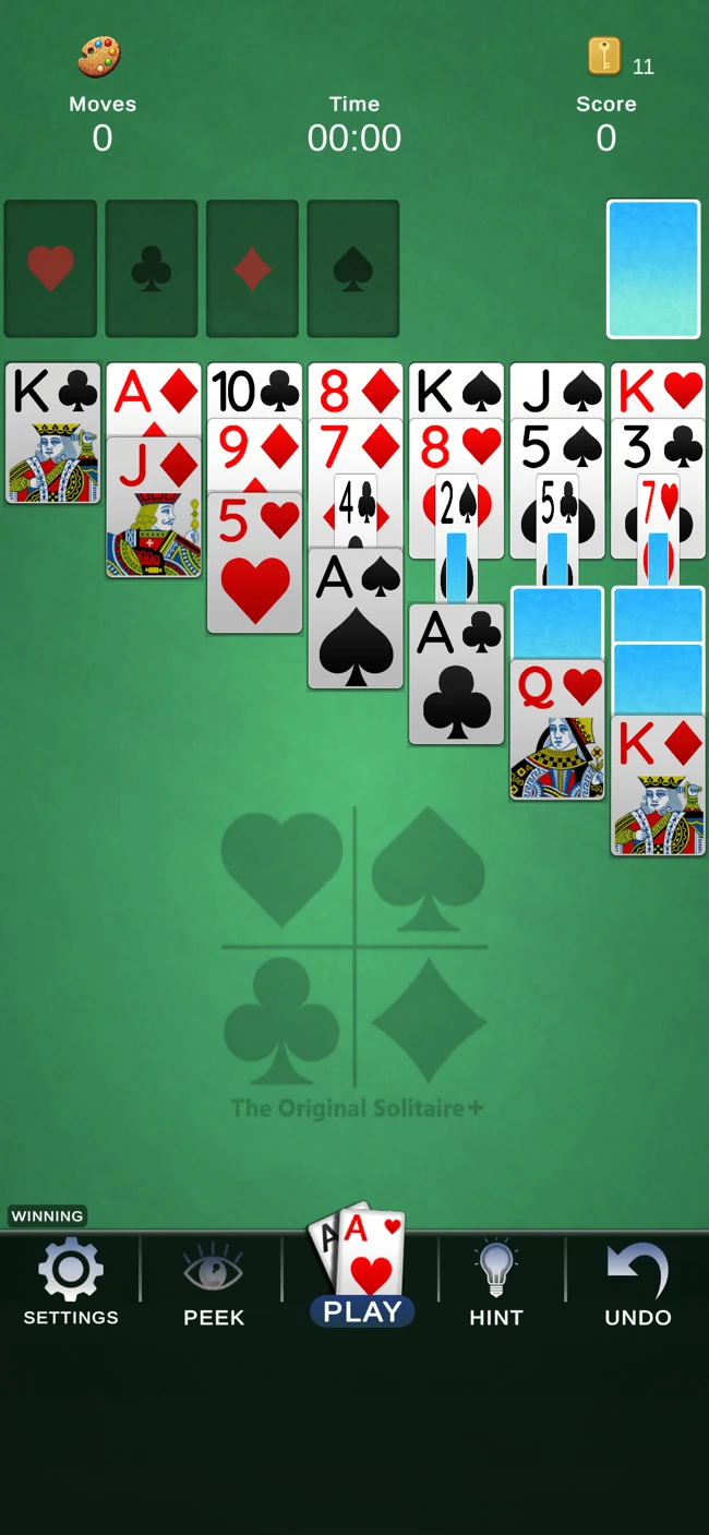 The Original Solitaire+ with Peek revealing the cards beneath the piles.